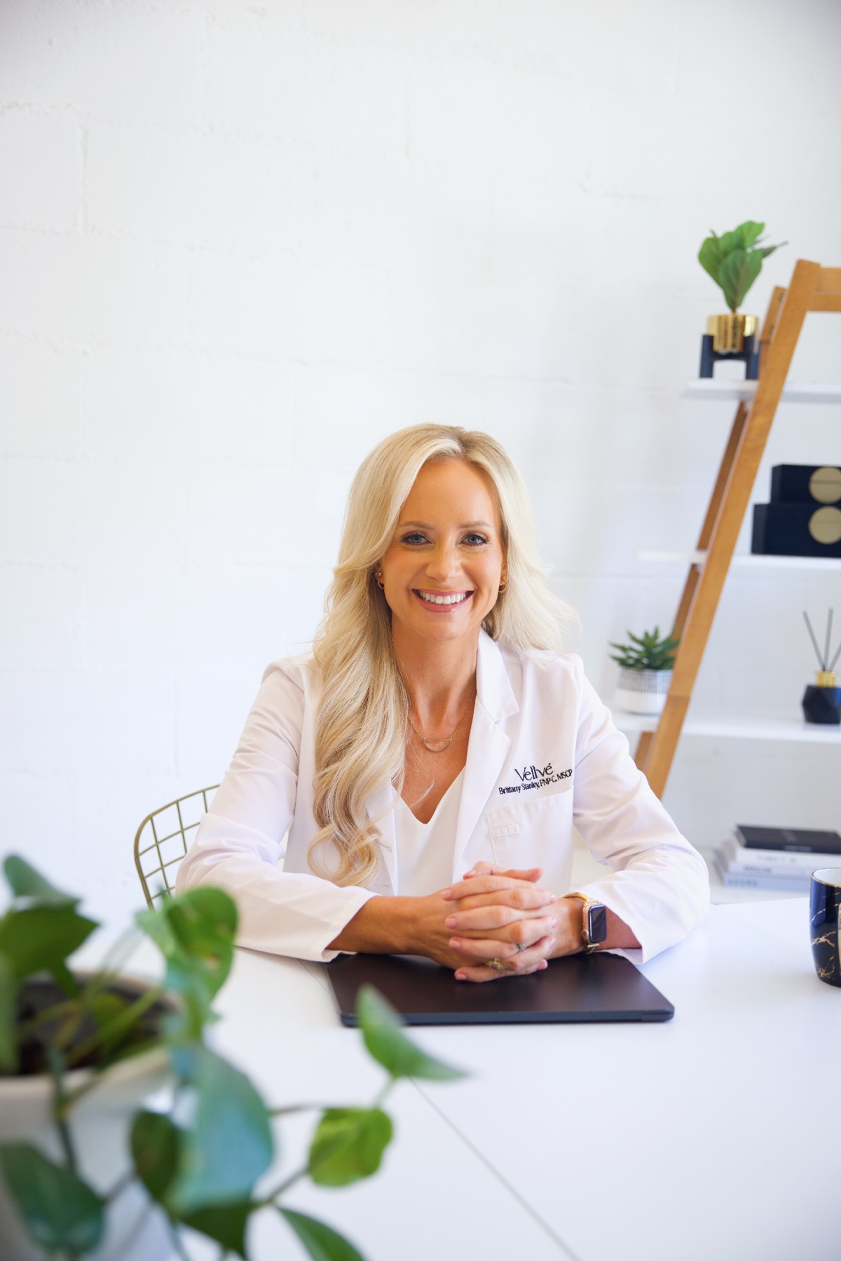 Brittany Stanley, FNP-C, seated with hands clasped — the provider guiding every step of The Method.
